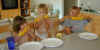 EatingCorn.jpg (32524 bytes)